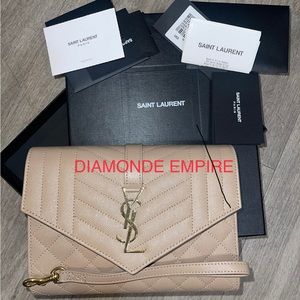 Almost new  YSL BEIGE CLUTCH